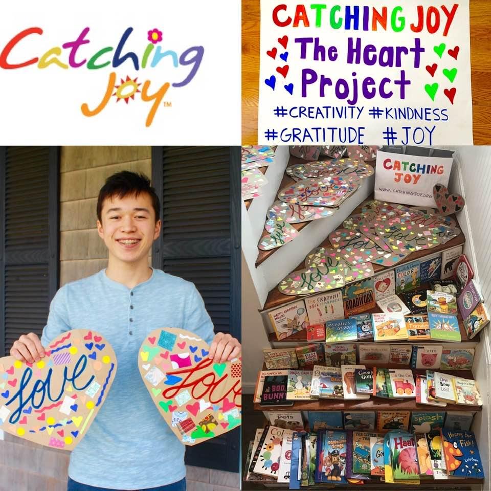 Catching joy logo with a picture of a person holding love signs