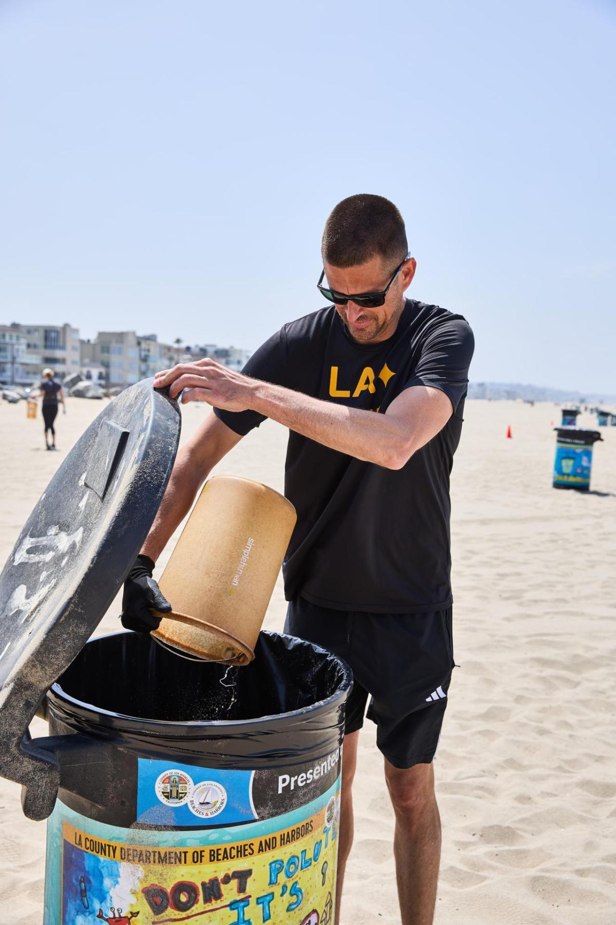 Volunteers picked up plastic bottles, food wrappers, and other debris polluting the shoreline.