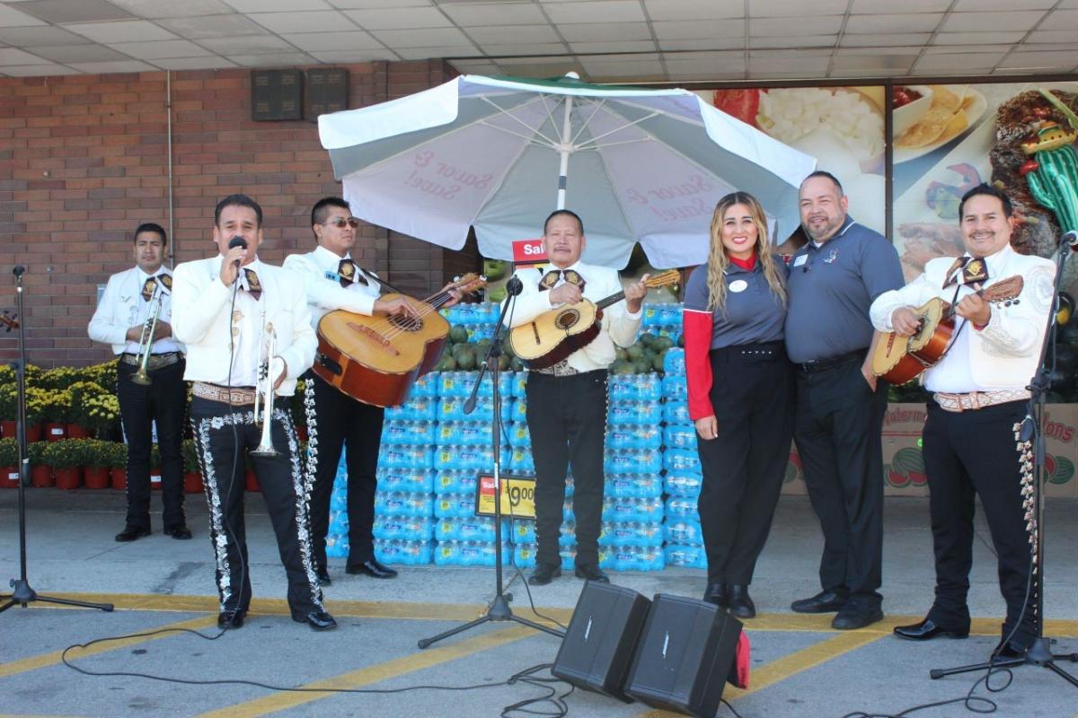 Mariachi band performs outside of Jewel-Osco store.