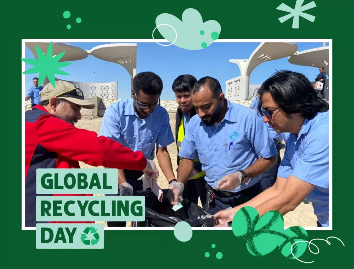 People placing things into a plastic bag: Global Recycling Day