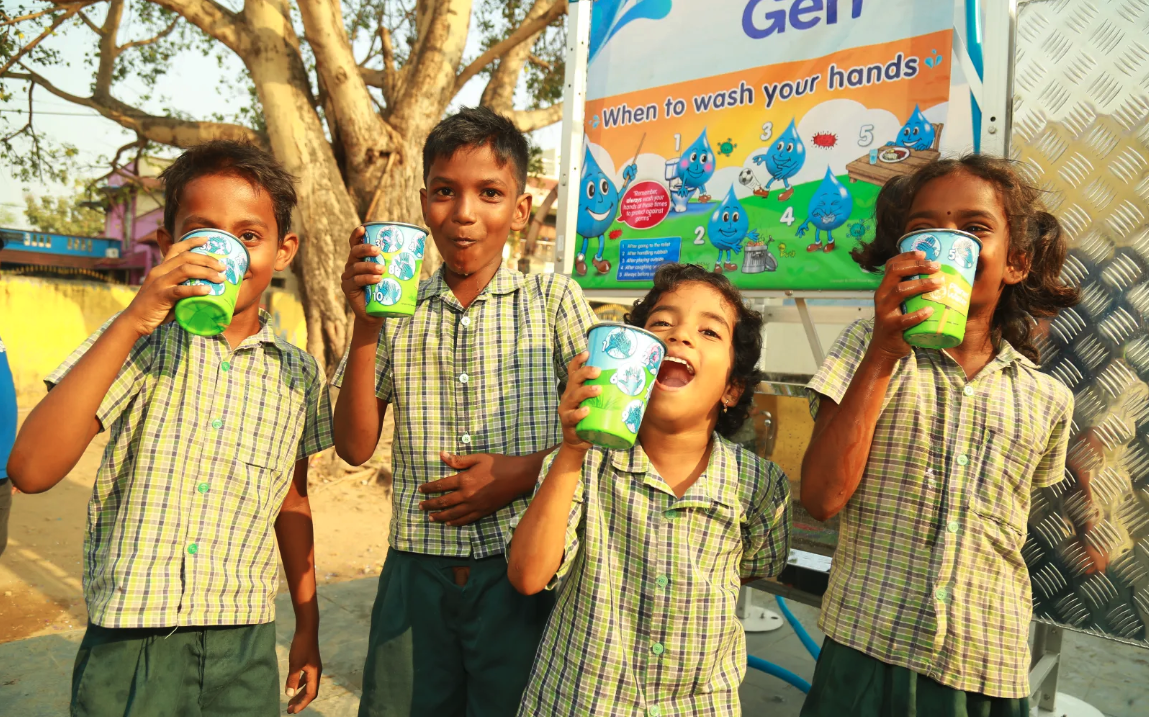 Kids drinking from colorful cups