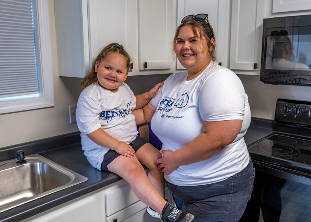 Adult and child in a kitchen