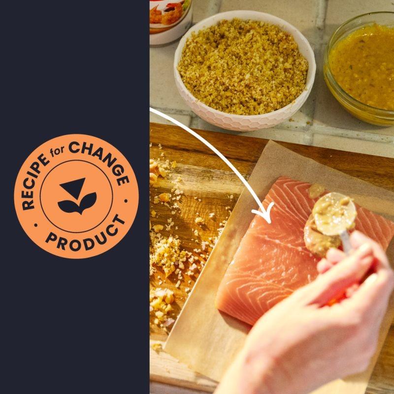 Our footprint is directly tied to what we make and sell. Albertsons Recipe for Change product logo next to a hand spooning mustard onto a piece of salmon.