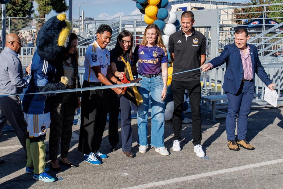 LA Galaxy defender Mauricio Cuevas, an alumnus of the school, helped cut the ribbon.