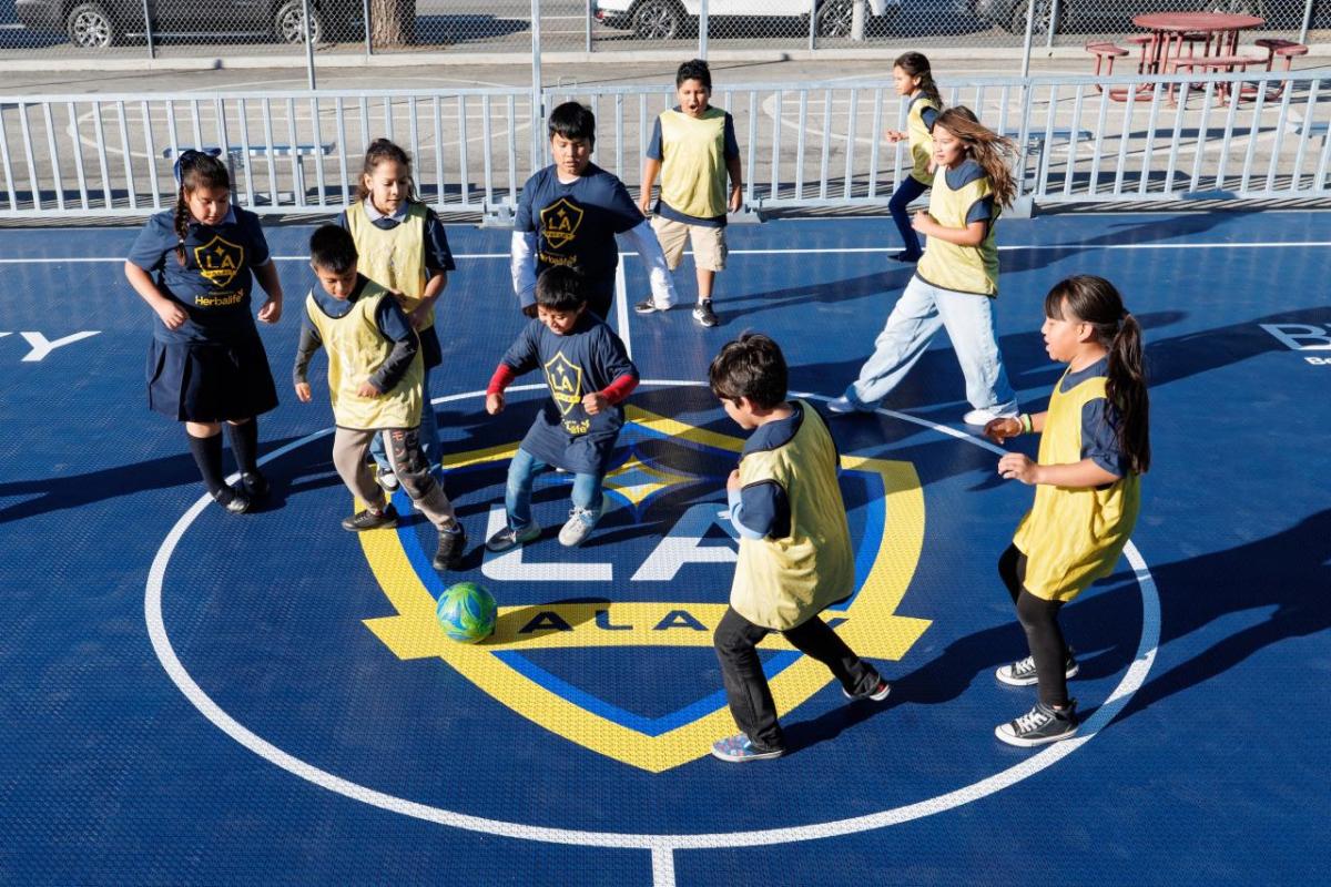 Students participated in a youth soccer clinic led by LA Galaxy defender Mauricio Cuevas.