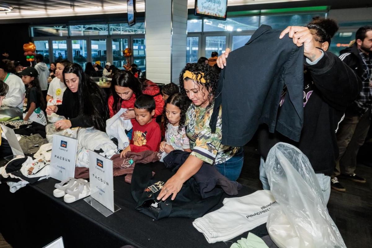 Children received apparel donated by partners like PACSUN, adding an extra touch of joy.