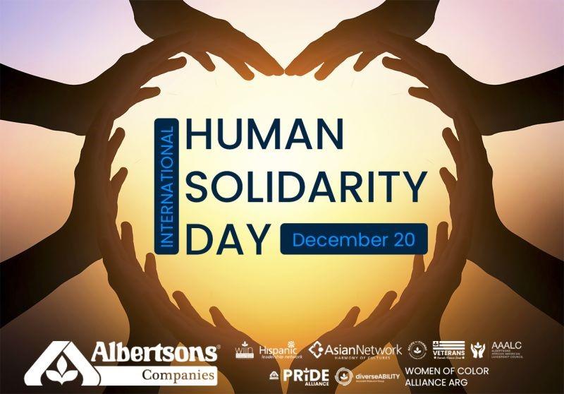 Various hands forming a heart with text that says "INTERNATIONAL HUMAN SOLIDARITY DAY December 20" with Albertsons Cos and banner logos 