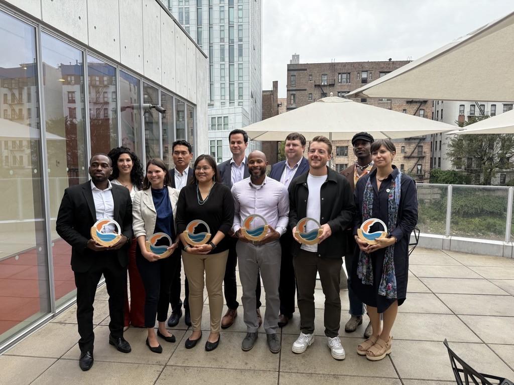 Honorees posed together with award