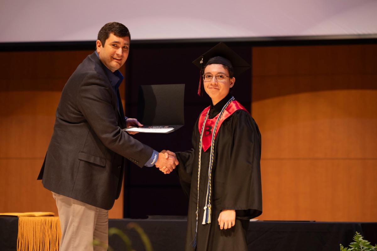 Student shaking hands