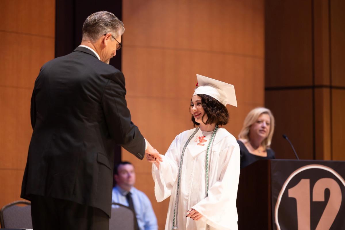 Student receiving diploma