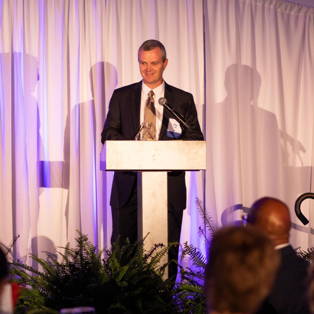 Senior Vice President Doug Long, a UF graduate, received the award on Rayonier's behalf.