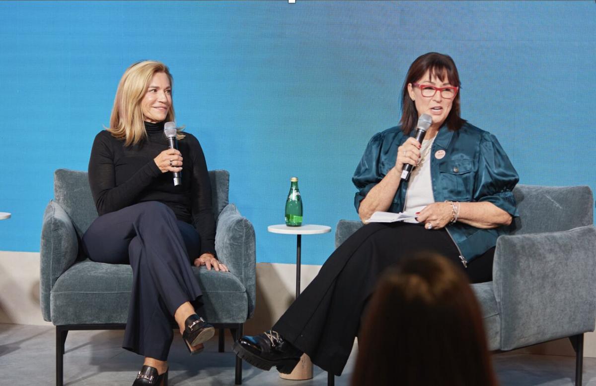 Laura Kohler and Kimberley Seldon sitting in armchairs with microphones