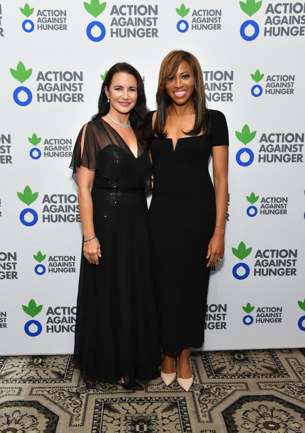 Kristin Davis and Zain Asher pose for a photo.