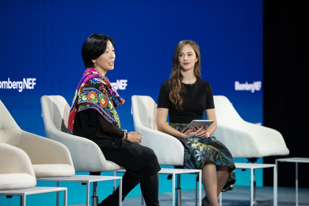 Two people in discussion: Edison International's Caroline Choi highlighted the company's nearly $800 million transportation electrification program, the largest for an investor-owned utility, at the BNEF Summit in San Francisco.