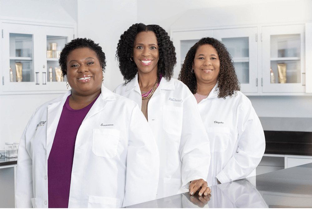 Three people in lab coats