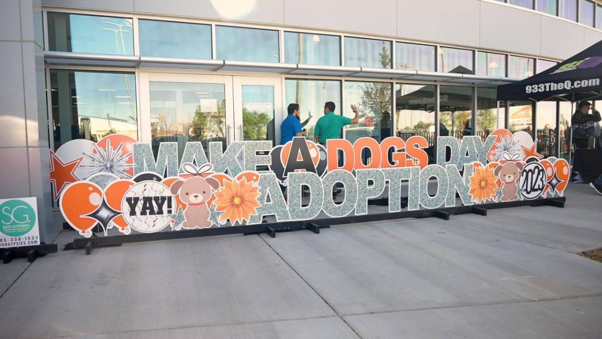 Sign: Make a dog's day yay! Adoption 2023