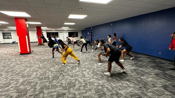 People dancing in an exercise room