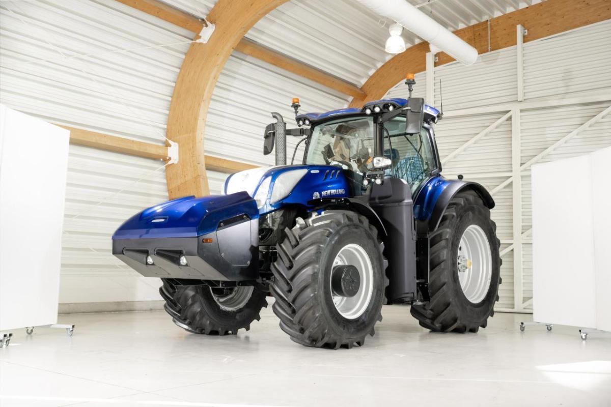 A blue tractor in a garage