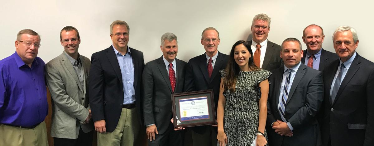 (L to R) Representative Mike Sundin; Frank Frederickson, Minnesota Power; Mike Schultz, Sappi; Senator Tony Lourey; Mark Gardner, Sappi; Olga Karagiannis, Sappi; Brian Hanson, APEX; Kevin McKinnon, Minnesota DEED; Ray Higgins, Minnesota Forest Industries; Congressman Rick Nolan