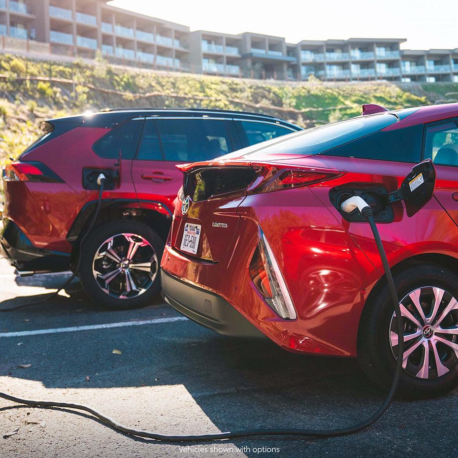 two parked red cars