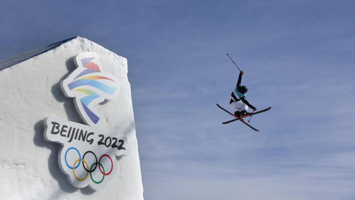 skier jumping off ramp