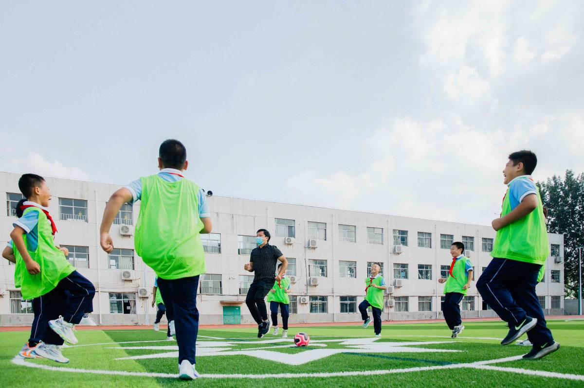 Students Play on Recycled Field