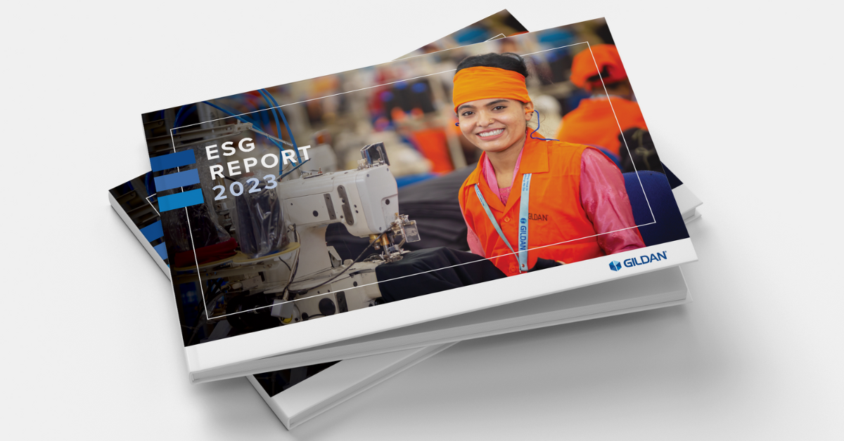 Gildan Celebrates Two Decades of Sustainability Reporting with the Release of its 2023 ESG Report Gildan's 2023 ESG Report cover page mocked up on a grey background