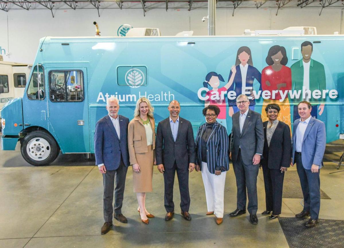 Truist and Atrium health leaders standing in front of Atrium Truck