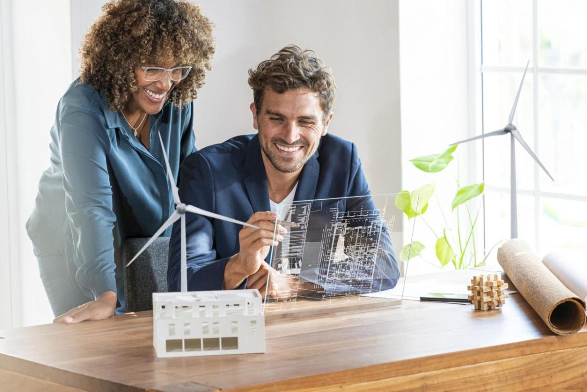 2 people looking at futuristic computer