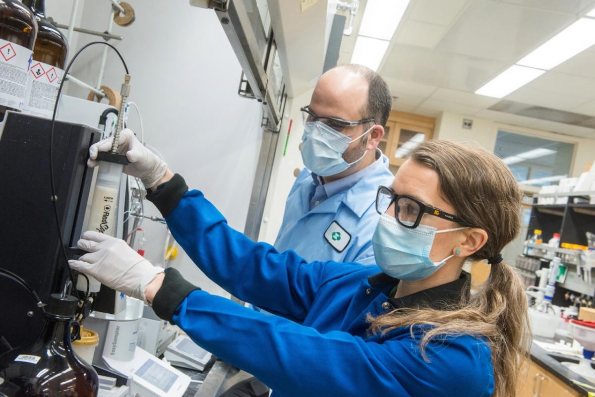 Workers in a biomedical lab