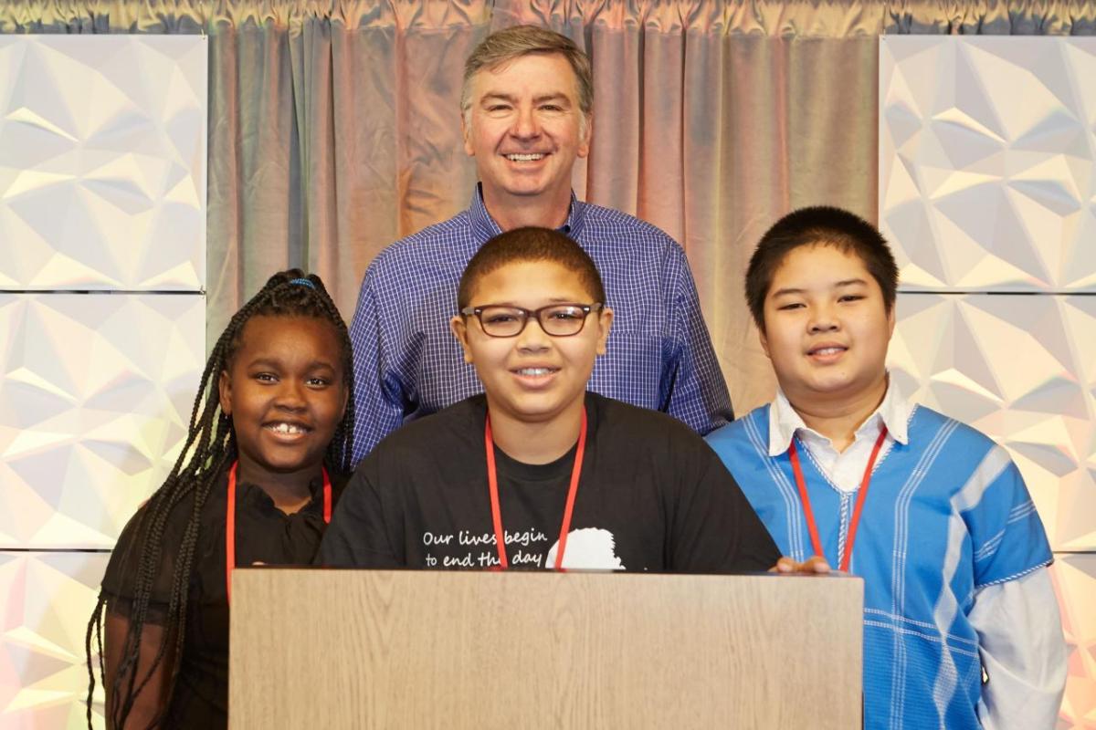 Jim Snee, chairman of the board, president, and chief executive officer of Hormel Foods with winners of the 12th annual Hormel Foods MLK essay contest that included: Ava Pigrum, Sacramento, Calif., Andre Smith, Minneapolis, Minn., and Michael Htoo, Willmar, Minn. Jim Snee, chairman of the board, president, and chief executive officer of Hormel Foods with winners of the 12th annual Hormel Foods MLK essay contest that included: Ava Pigrum, Sacramento, Calif., Andre Smith, Minneapolis, Minn., and Michael Htoo, Willmar, Minn.