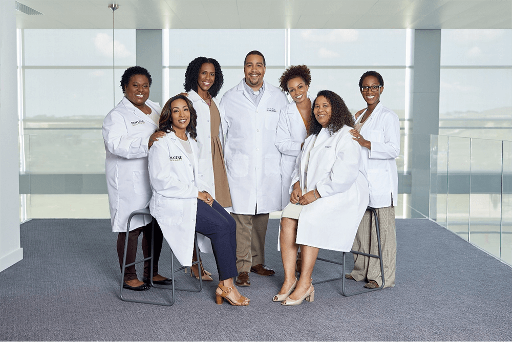 Group of people in lab coats