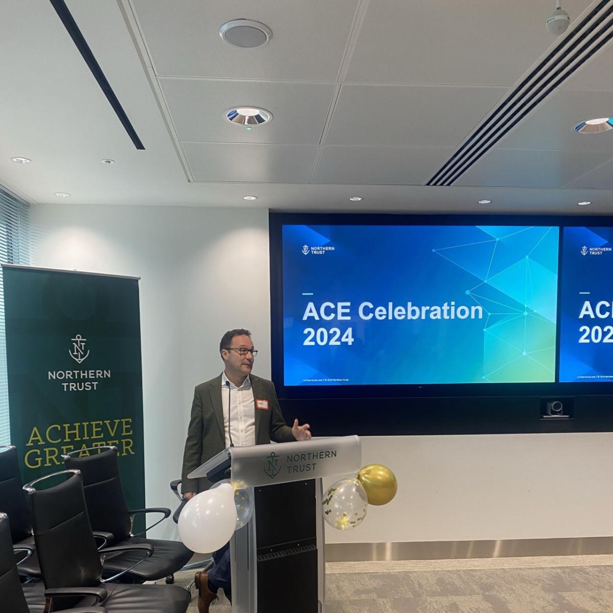 A person speaking at the ACE celebration 2024 event