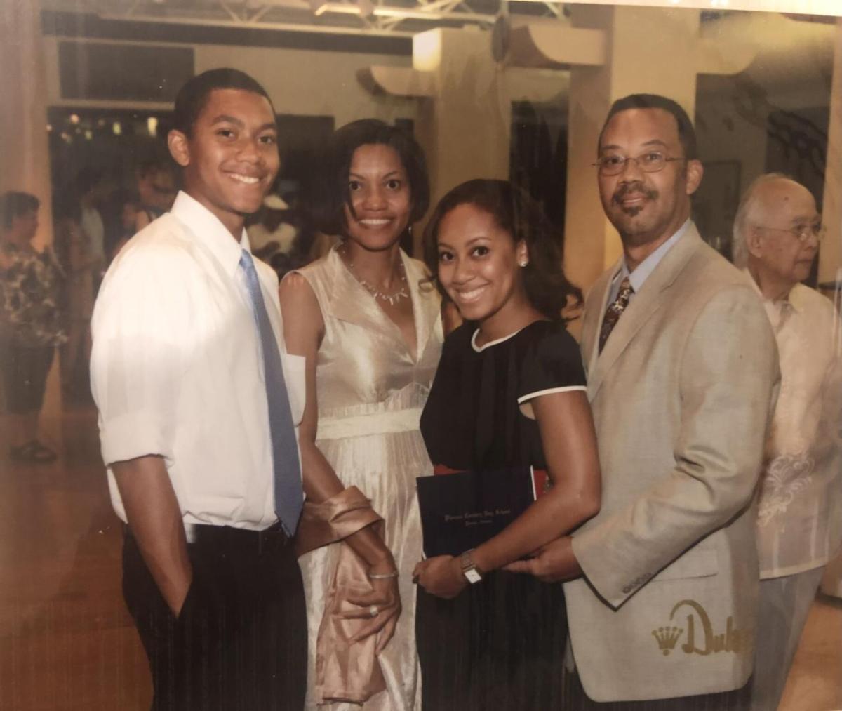 a group of people wearing formal clothing