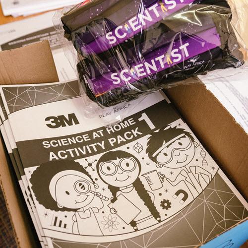 3M Science at Home Activity Pack Cover (Cover shows three smiling children).