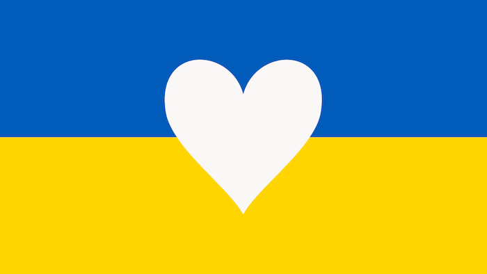 Flag of Ukraine with a heart in the center.