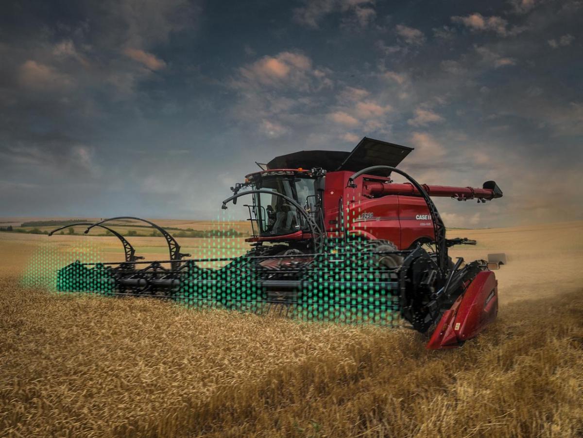 Tractor in a field with a green graphic added