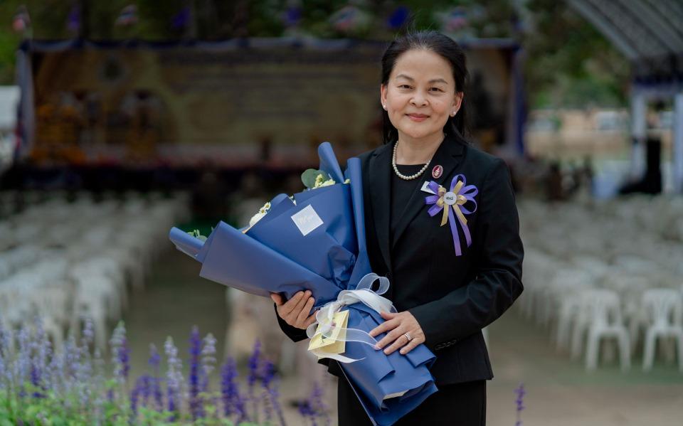 person holds bouquet of flowers