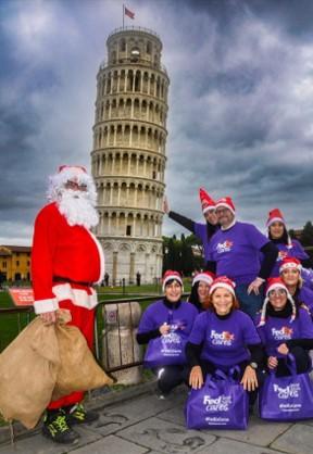 People stood in front of the leaning Leaning Tower of Pisa