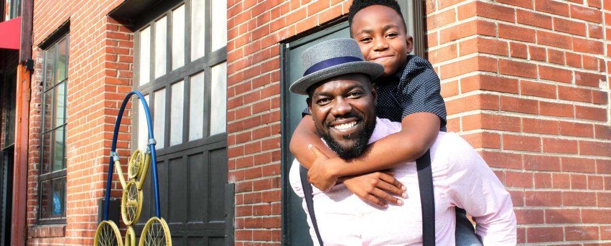 Jesse Swanagan with his son, Jesse III, at City Garden Montesorri School in St. Louis.
