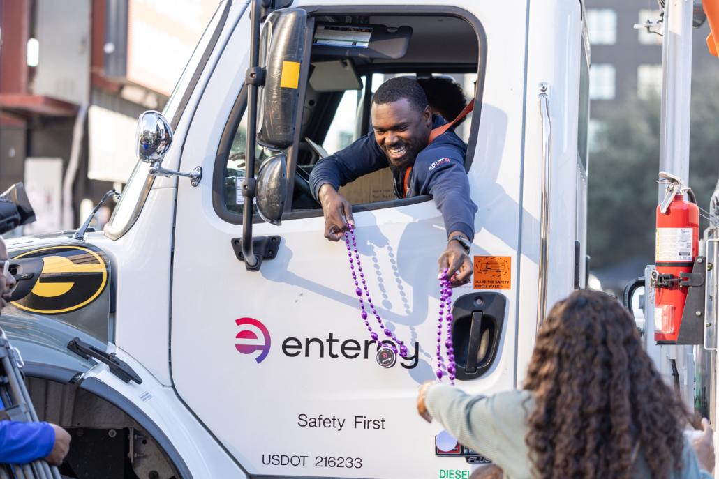 person handing out beads