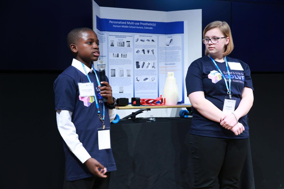 From L to R: Simon-Peter Frimpong and Grayson Fast of Horizon Middle School in Aurora, CO, present their prosthetic enhancements for local wounded veterans during the Samsung Solve for Tomorrow Finalist Pitch Event on Tuesday, March 15, 2016 in New York.