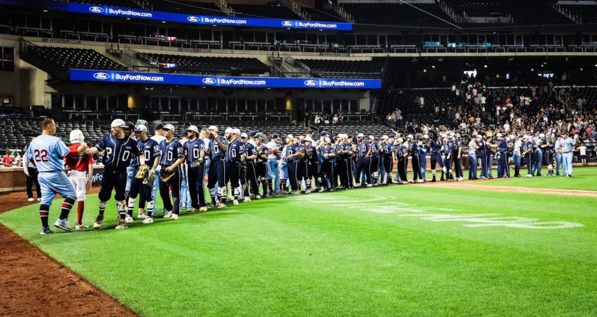 Two teams line up to congratulate each other