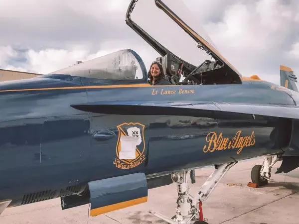 Joan Melendez Misner inside airplane cockpit