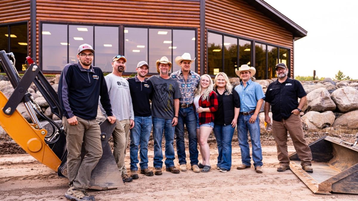 Group of people in front of a building.