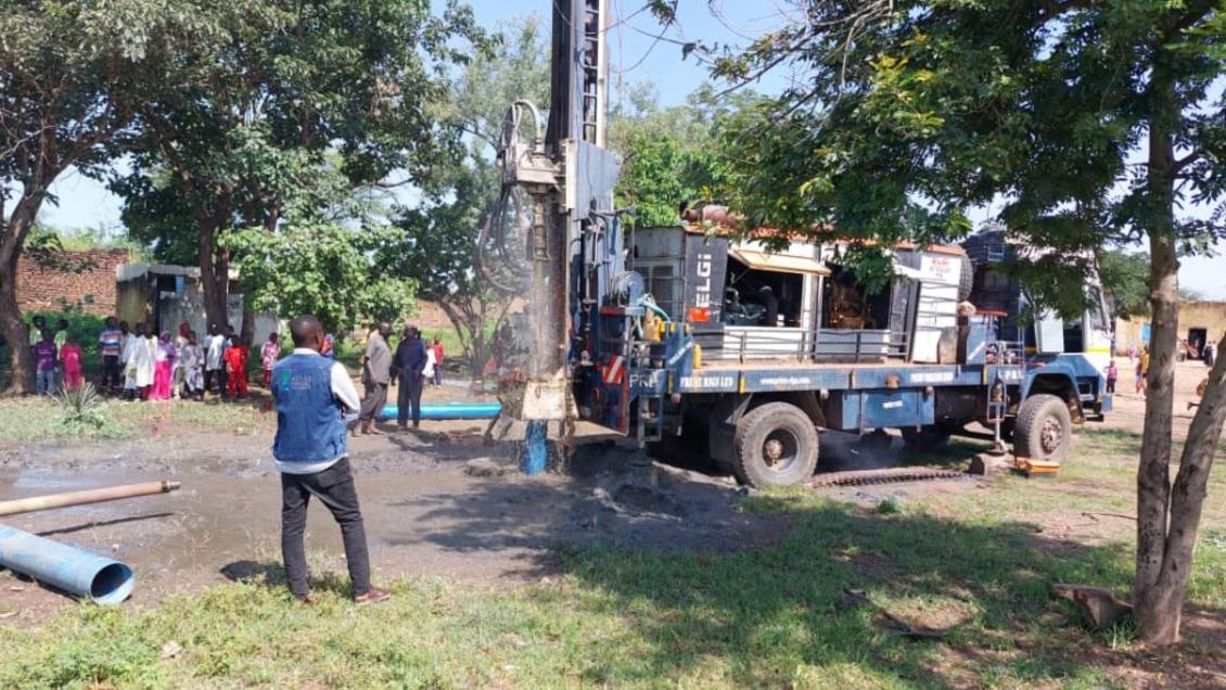 Action Against Hunger drills boreholes to supply clean water.