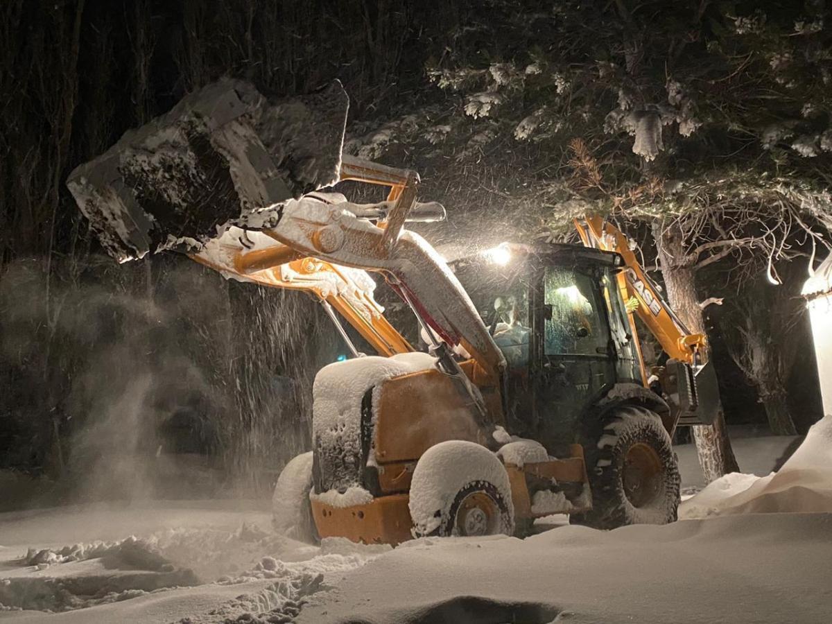 The CASE Backhoe Loader is hard at work clearing snow in the Argentinian high Andes