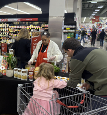 A group of people at a grocery store