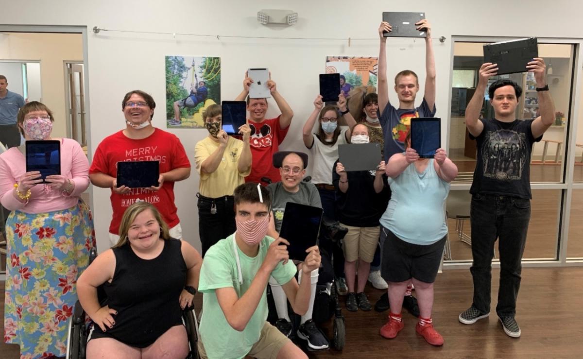 Extra Special People (ESP) Camp Hooray participants receiving equipment donation. Photo credit: Extra Special People