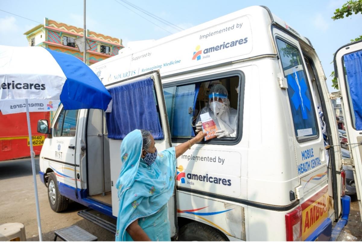 Americares staff providing mobile health care and information regarding COVID-19 in India. Photo credit: Americares